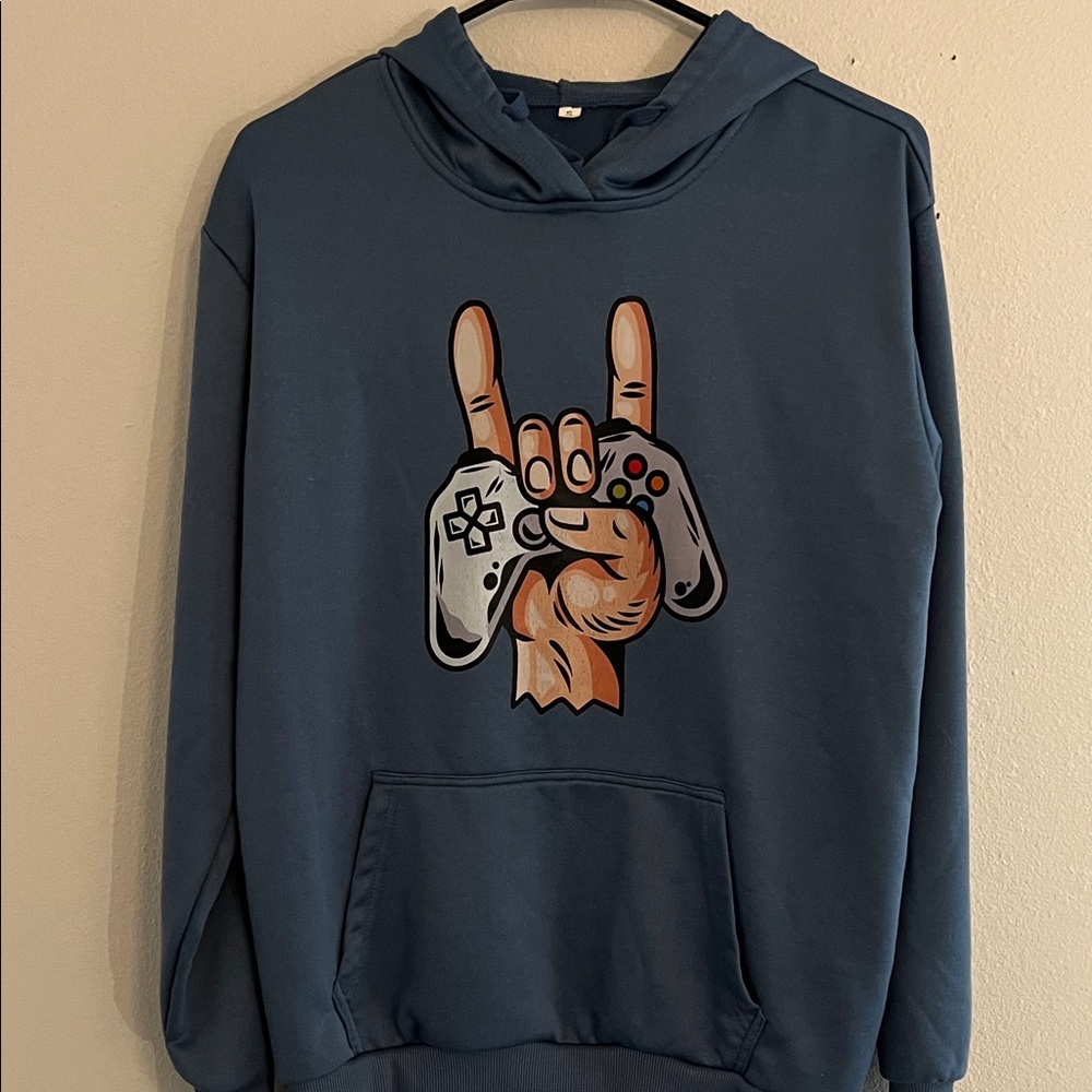 Slate Blue sweatshirt w/ hoodie Nintendo graphic. Do not know the brand name.S